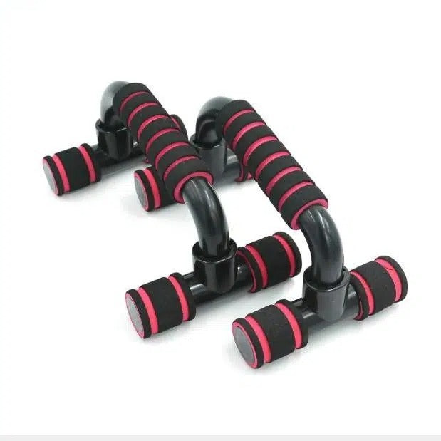 Red and black push up bars for chest with padded handles designed for wrist support and stability