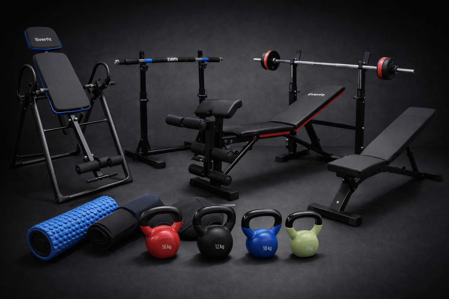 Home gym strength training equipment setup with weights and recovery tools